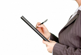 Grafika profilu kobiety trzymającej notes i długopis